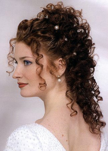 Acconciatura sposa capelli ricci