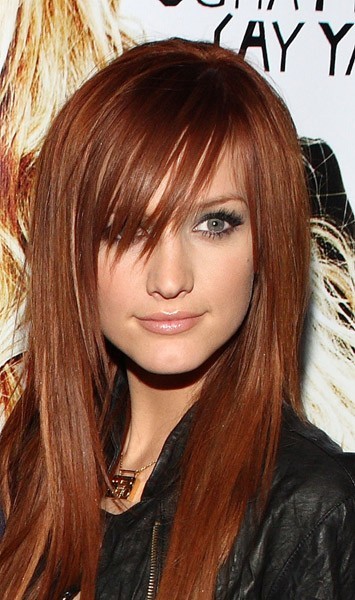 Meches rosse su capelli castani