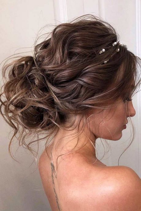 Capelli ricci sposa 2021