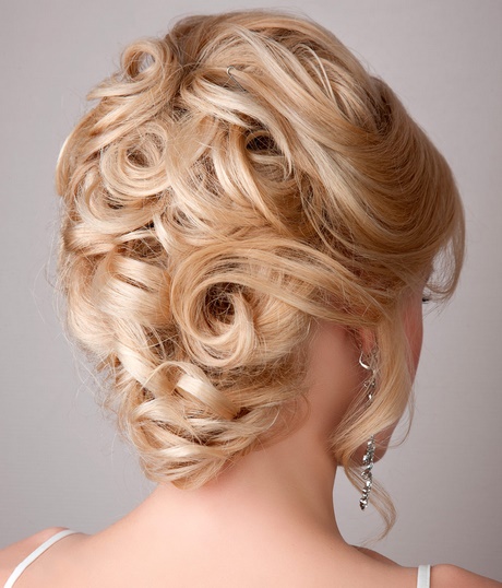 Acconciature sposa capelli raccolti morbidi