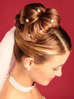 Acconciature capelli raccolti sposa